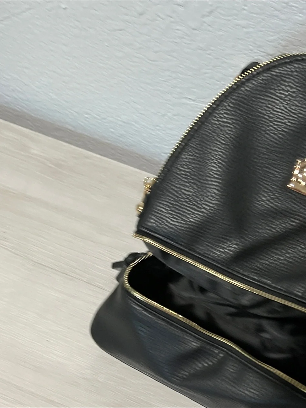 Black Leather Backpack with Gold Hardware